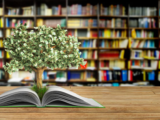 Tree growing from book A big open book