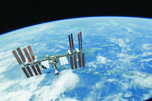 Researchers from all 15 supporting countries and five participating space agencies can conduct research on the ISS, which is shown here orbiting Earth. (Photo courtesy of NASA .)