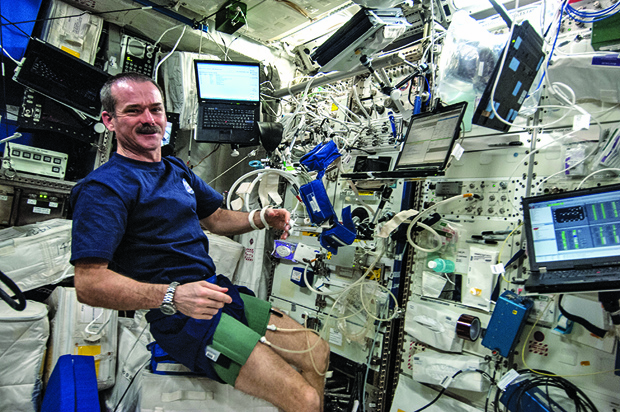 Living in the unique environment in space, the health of the astronauts is carefully monitored. One area of special interest is bone loss, which astronauts experience at an accelerated rate in weightlessness. In addition, other aspects of health are measured. Here, Commander Chris Hadfield of the Canadian Space Agency conducts pulmonary and cardiovascular testing that will be useful for astronaut health monitoring during long-term space flights and may also have implications for testing patients, especially the elderly, who are at risk for fainting. (Photo courtesy of NASA .)