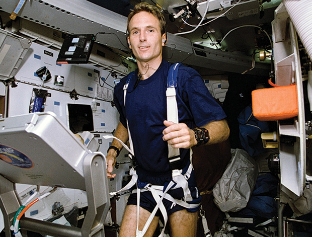 As a consequence of prolonged space travel, astronauts lose muscle and bone mass. This has led to the development of numerous countermeasures, including exercise equipment designed for a microgravity environment. Taken before astronaut Jerry Linenger went up to the Mir space station in 1997, this photo shows Linenger trying out a treadmill during an 11-day mission aboard the space shuttle Discovery in 1994. While on Mir, he spent two hours a day exercising. Despite the work, he still returned to Earth with 13% bone loss. (Photo courtesy of NASA .)