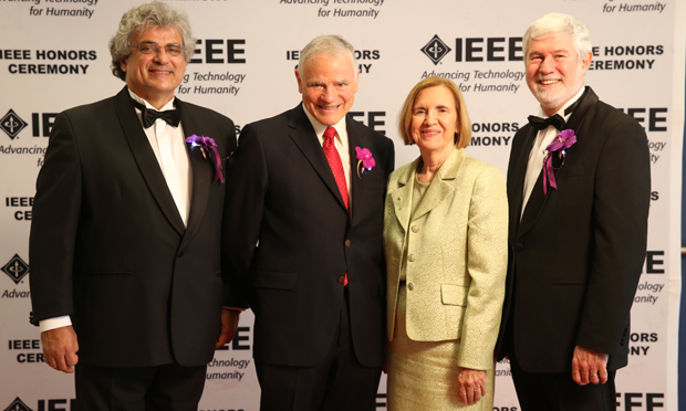 CAPTION: Pictured above, from left to right, Robert de Marca, IEEE President, Leroy Hood, recipient of the 2014 IEEE Medal for Innovations in Healthcare Technology, Donna Hudson, past EMBS president and current chair of the IEEE Lifesciences Technical Community and Howard Michel, IEEE President-Elect.