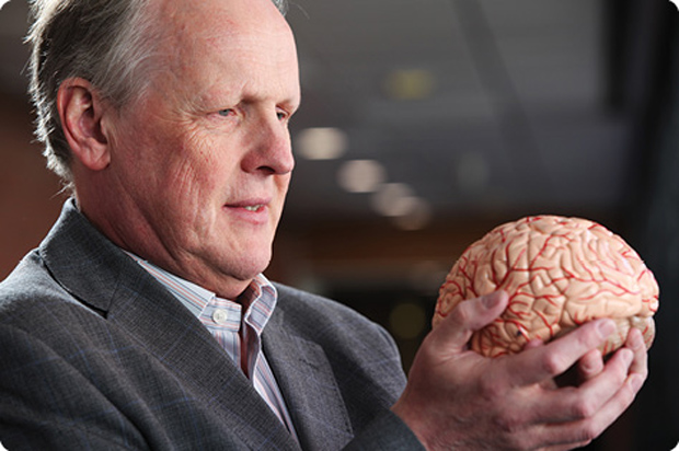 Steve Furber, ICL professor of computer engineering in the School of Computer Science at the University of Manchester, United Kingdom, with a model brain. (Photo courtesy of Steve Furber/University of Manchester.)