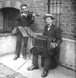 The bandoneón was introduced around the 1920s, replacing the flute and the guitar. These street musicians earned their livings collecting a few pesos a day. In those days, one American dollar was equivalent to 2.50 pesos (which were named pesos moneda nacional or $m/n).