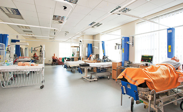 FIGURE 1 - BMSC gives health care professionals access to 12 medium-/high-fidelity patient manikins in four audio-visual-monitored simulation suites, including a six-bed high-dependency ward. (Photo courtesy of BMSC.)
