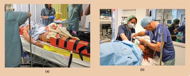 FIGURE 2 - (a) and (b) The manikins at BMSC provide training opportunities for trauma and emergency care. (Photos courtesy of BMSC.)