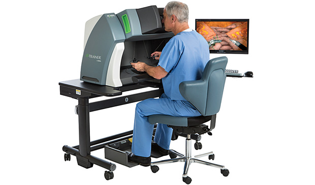FIGURE 4 - The dV-Trainer uses virtual reality simulation to train surgeons to use surgical robotics. (Photo courtesy of Mimic Technologies.)