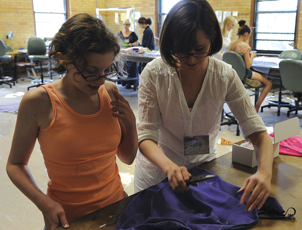 FIGURE 3: Lucy Dunne (right) is director of the Wearable Technology Lab at the University of Minnesota, where she and her students develop innovative smart textiles to look and feel like everyday clothing. (Photo courtesy of the University of Minnesota College of Design.)