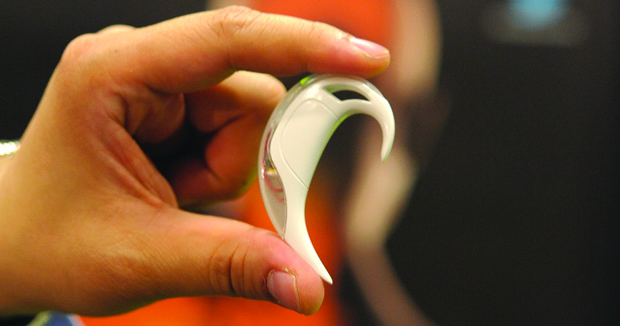 FIGURE 6: Yang and his group designed the award-winning e-AR sensor. Inspired by the function of the human inner ear, this small device fits discreetly behind the ear and captures similar information, i.e., the balance of the wearer. With advanced signal processing, further information about the gait, posture, skeletal/ joint shock-wave transmission, and activity of the individual can be deduced. (Photo courtesy of Sensixa Ltd.)