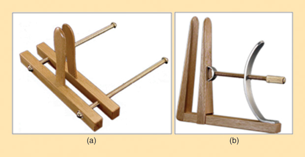 Figure 1: Vaginal speculums [23]: (a) Al-Zahrawi’s design and (b) and the ancients’ design. (Photo courtesy of Fuat Sezgin.)