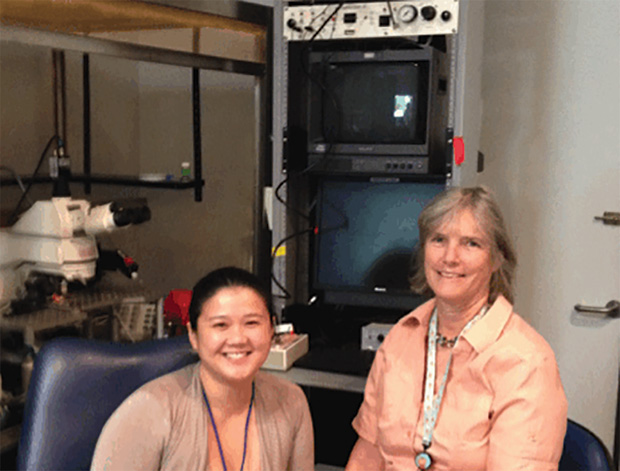 Figure 5: Oregon Health and Science University’s Kathleen Grant (right) with a colleague. Grant is working on ways to visualize activation of a particular neural circuit through different doses of ligand in nonhuman primates using brain scanning.