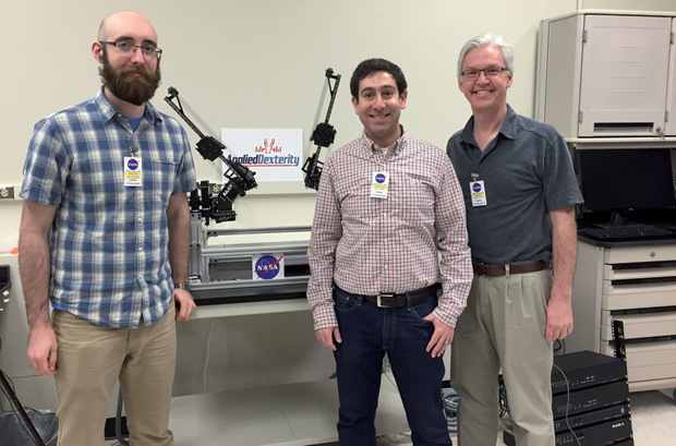Figure 8 : From left, Applied Dexterity researchers Andrew Lawler, John Raiti, and David Drajeske took the RAVEN robot to NASA’s Johnson Space Center in Houston this spring. (Photo courtesy of Applied Dexterity.)