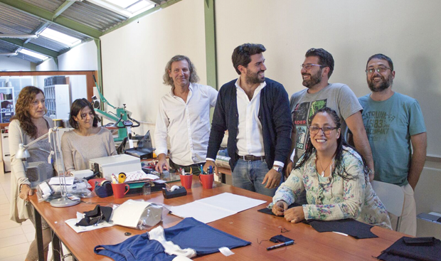 Figure 2: The designers and engineers at Smartex work on developing new sensorequipped garments, early versions of which are being distributed to clinicians and researchers. Paradiso is on the far left. (Photo courtesy of Smartex.)