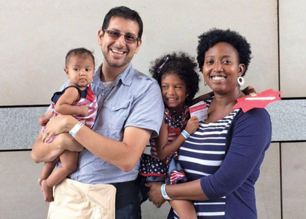 Dannielle Solomon Figueroa with her family. She has a Ph.D. degree in BME, works as a senior scientist in vaccine commercialization at Merck & Co., and is the mother of two daughters.