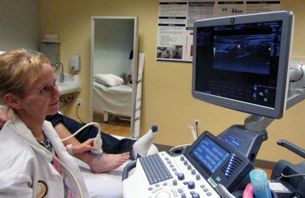 Figure 3: Rapid bleed detection with musculoskeletal ultrasound and power Doppler being used in a clinic for patients with hemophilia presenting with joint pains. (Photo courtesy of the Hemophilia and Thrombosis Treatment Center, University of California, San Diego.)