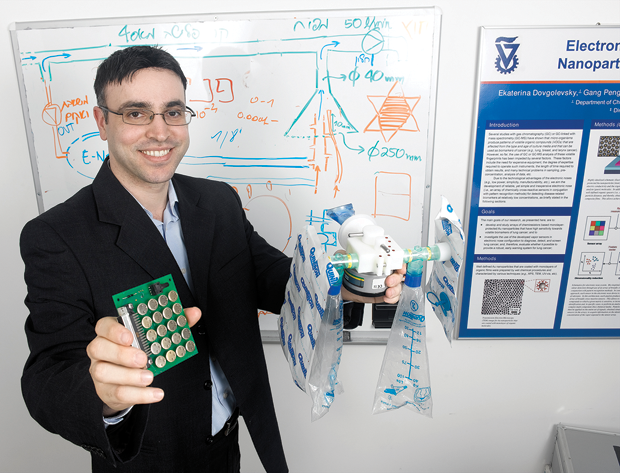 Figure 2: Haick with an early version of the cancer-sensing technology. (Photo courtesy of Hossam Haick/Technion Israel Institute of Technology.)