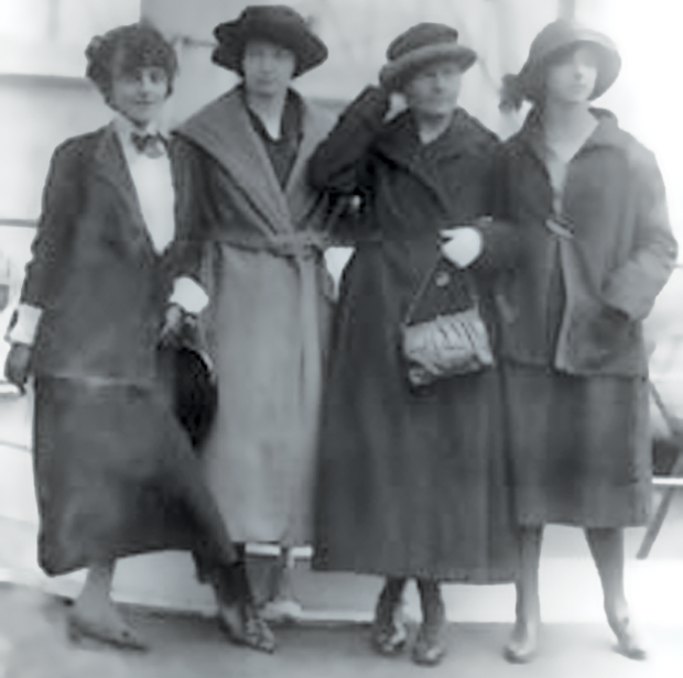 Figure 3: From left: Marie Mattingly (“Missy”) Meloney with Irène (23), Marie, and Ève Curie (16) as they arrived in New York City on 12 May 1921 [20]. (Image courtesy of the Library of Congress.)