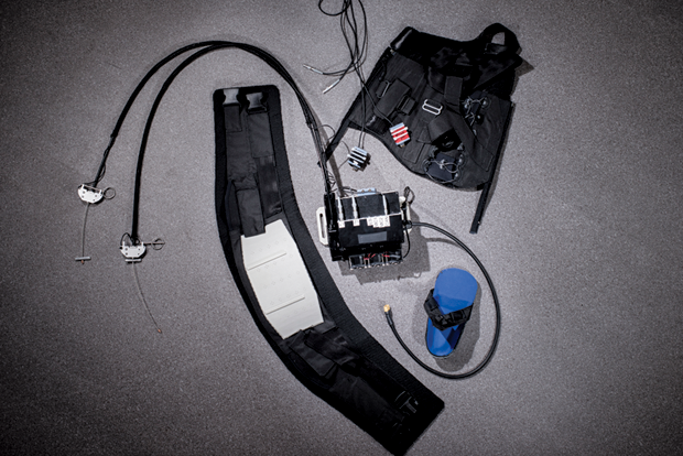Figure 5: The soft exosuit components include a waist belt, leg strap, and calf wrap. These functional textile anchors interact with a modified shoe to assist in moving one’s ankle. (Image courtesy of Rolex Awards/Fred Merz.)