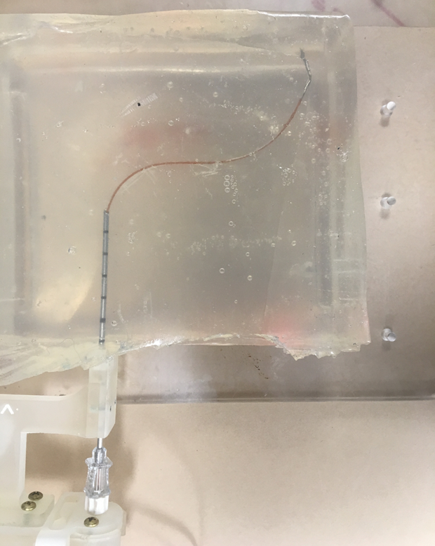 steerable needle navigates in artificial tissue