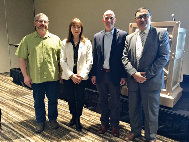 Ahmed Morsy, editor-in-chief of IEEE Pulse (far right), poses with three of the four keynote speakers from the recent IEEE Pulse on Stage event. From left: Rich Caruana, Ph.D., Microsoft Research; Bettina Experton, M.D., Humetrix; and Jon Duke, M.D., Georgia Tech. (Photo courtesy of Cynthia Weber.)