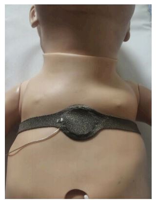 The placement of the FingerTPS™ palm sensor on the manikin’s chest.