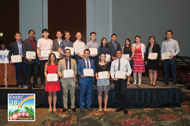 Figure 1. Finalists of the IEEE EMBS Student Paper Contest receiving their awards from IEEE EMBS president Dr. Nigel Lovell.